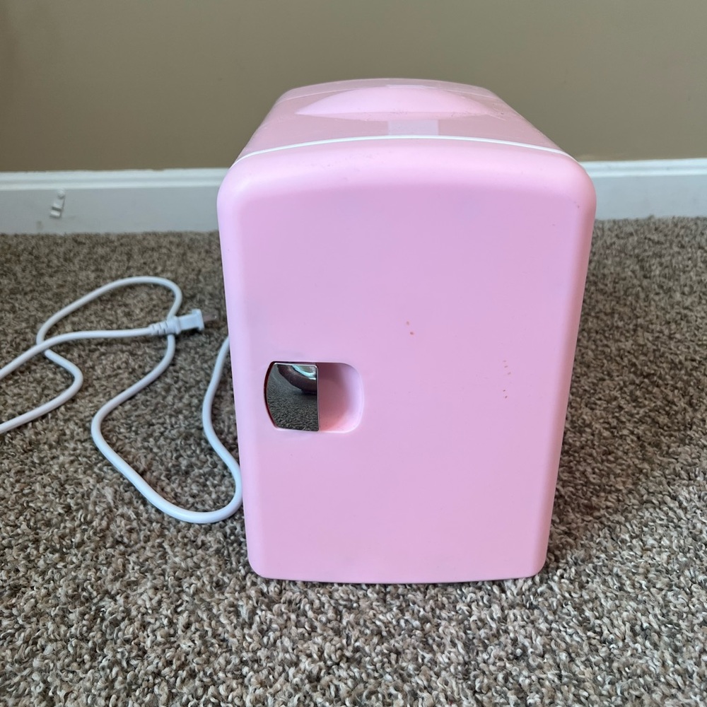 Pink mini fridge